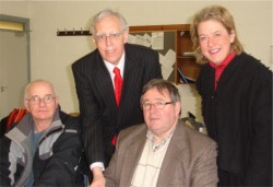 Fisheries Minister Tony Killeen and Senator Cecilia Keaveney pictured with seated, left, Charlie O'Donnell of Malin Head Fishermen's Co-op and Seamus Bovaird, board member of the Inishowen Development Partnership.