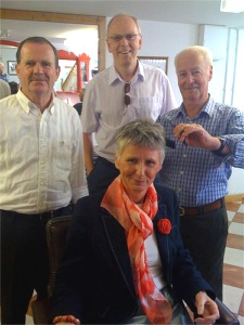 Labour Party European election candidate Susan O'Keeffe, who lost out this time, pictured in Patrick Harkin's barber shop chair in Moville. Also pictured are newly-elected Labour Party representative Cllr Martin Farren, left, and his campaign manager Dr Don McGinley.