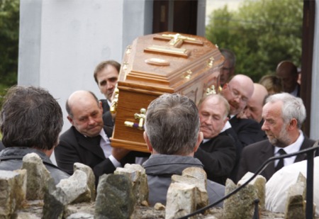 Hughie Friel's reamains are carried to their final resting place in Urris, Clonmany.