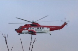 The Sligo Coast Guard search and rescue helicopter leaves Greencastle after a training exercise with students from the local fisheries college.