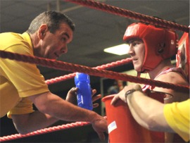 Willie McLaughlin takes advice from his coach Stephen Friel.