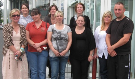 Donegal Travellers Project staff members at their new office on Pearse Road in Letterkenny. Front from left are Siobhan McLaughlin, Rose Ward, Patricia McGinley, Ann Marie Ward, Ann Friel and Hugh Friel. Back from left are Annmarie Keogh, Maeve McIvorand Ann McLean.