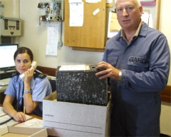 Garda Charlene Callaghan and Sgt. John O'Keefe packing up to leave the old station for the last time.