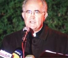 Parish priest Monsignor Joseph Donnelly leads a prayer vigil.