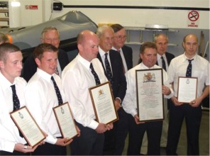 Receiving their awards are, from left, Stephen McGavigan, Alan O'Hagan, George O'Hagan, Mark Barnett and Gregory McDaid. Absent from photograph is Dan Gallinagh.